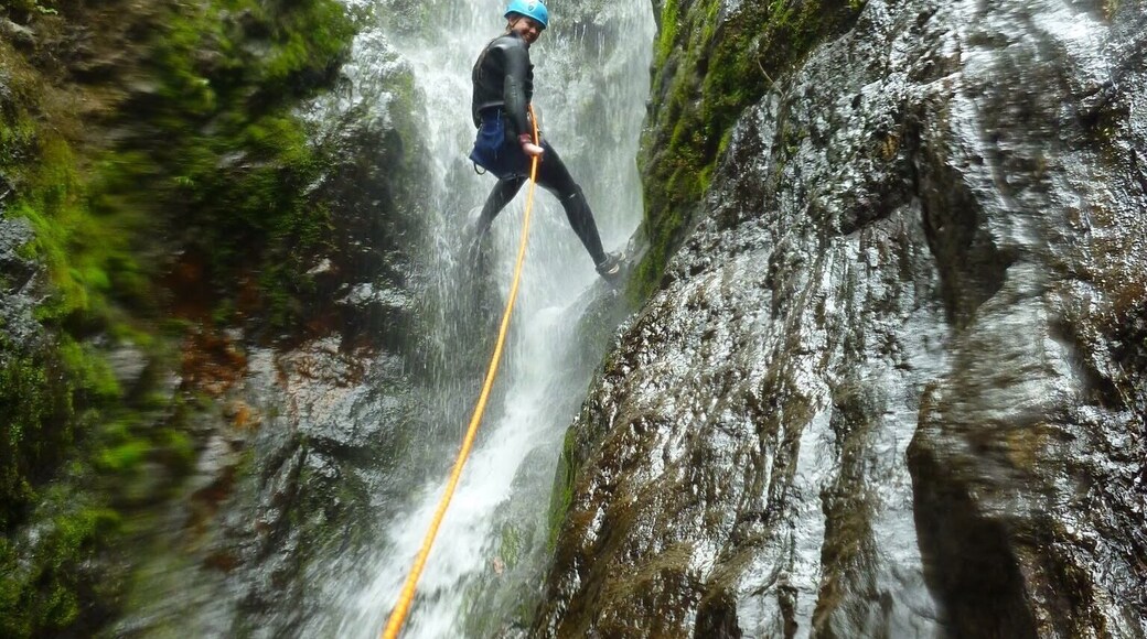 Canyoning down the Sleeping God Canyon in Thames.