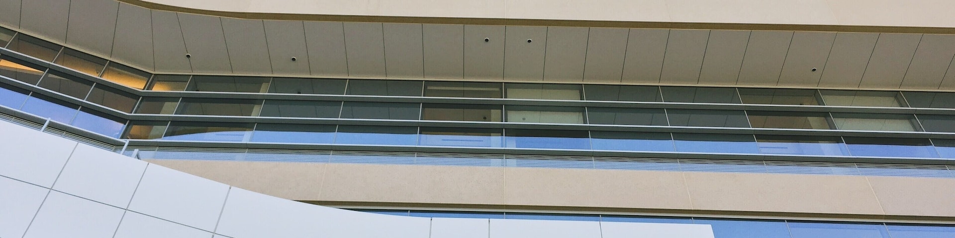 Beautiful reflections, layers of metal, interwoven shapes & joints. Look up next time you're in the area and try to appreciate the #details of glass, metal and the shapes they create.
Tip: at just the right moment on a perfect California sunset the glass on the parking structure side reflects gorgeous pinks, oranges, blues - all the amazing colors we love at sunset.