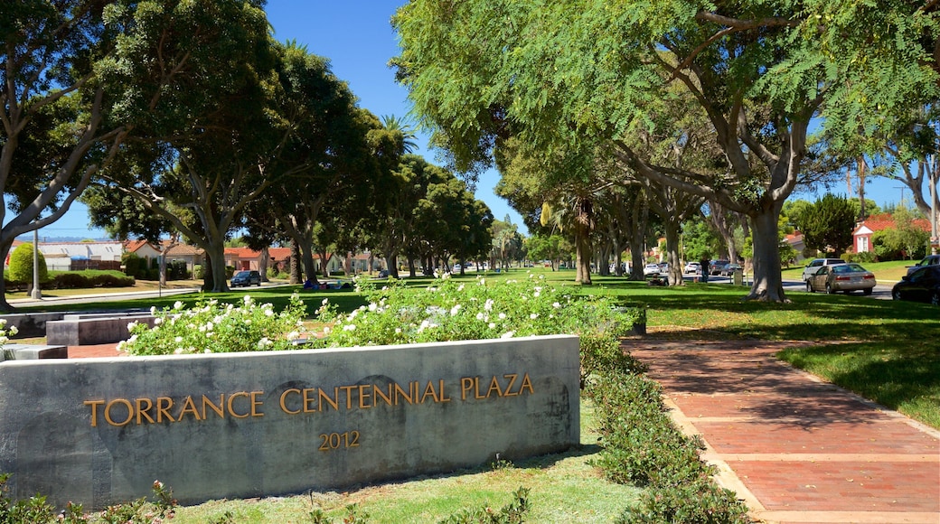 Torrance showing signage, a garden and wild flowers