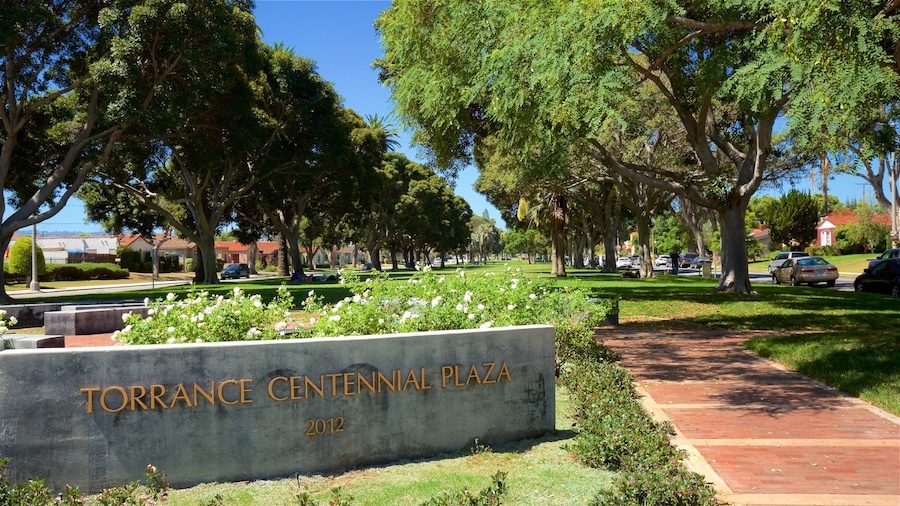 Torrance which includes a park, signage and wild flowers