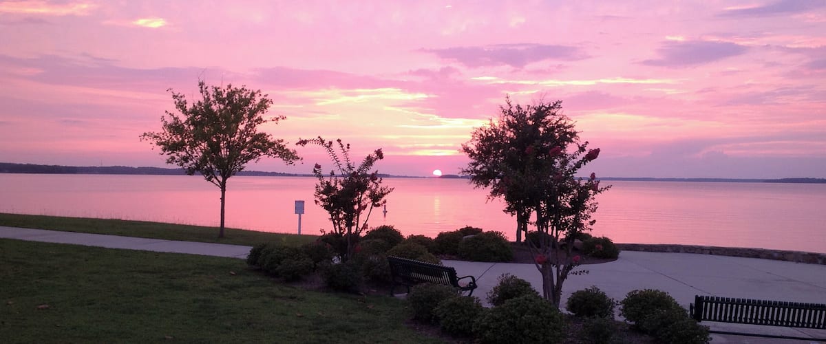 A beautiful Lake Murray sunset from Dreher Shoals Dam on the Saluda River. Lake Murray is about 12 miles northwest of Columbia, South Carolina.
This picture was taken in August 2012 from the south side of the Dreher Shoals Dam. Lake Murray is located within 4 counties of central South Carolina. It's a popular lake for boating, fishing and water sports.
My wife and I are fortunate to live on this beautiful lake - about 10 miles by boat from this spot.
#lakemurray #lakemurraysc