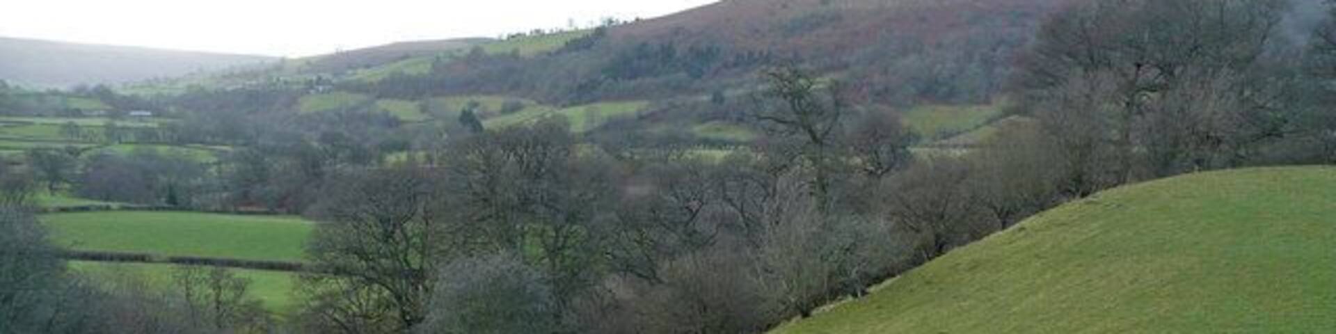 Curved landscape The near field edge is mirrored by the domed outline of Wylfre in the next square to the west.
