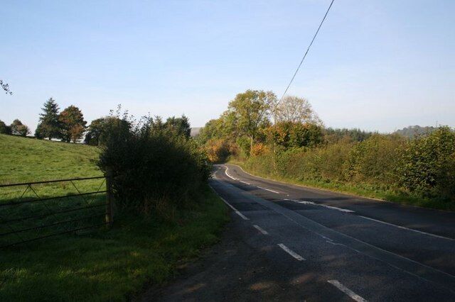 Road to Builth The road to Builth as it passes the track to Ffynnonau