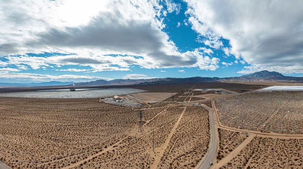 Drone panorama over Ivanpah solar thermal power plant in California during daytime sunshine