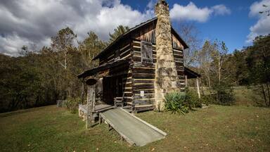 Historical Log Cabin In The Appalachian Mountains Of Kentucky. Historic log cabin on display at the Gladie Visitors Center in the Daniel Boone National Forest.