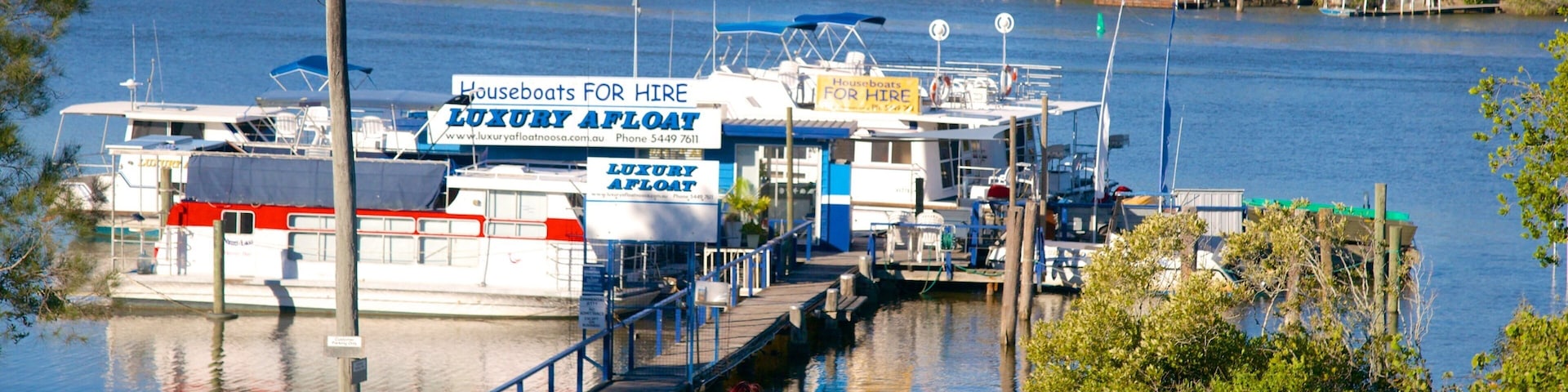 Tewantin which includes a bay or harbor and general coastal views