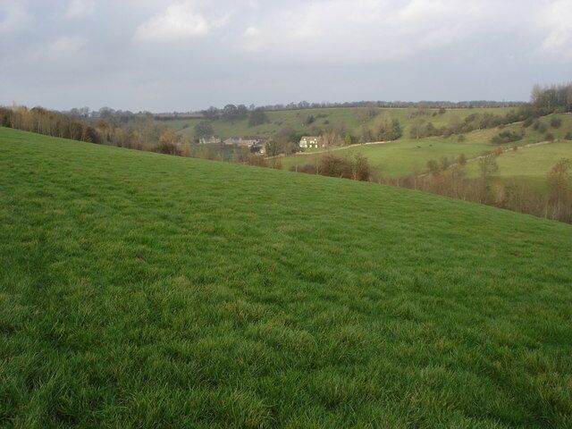 Newington Bagpath Newington Bagpath is no more than a few houses in a valley with the small church above.