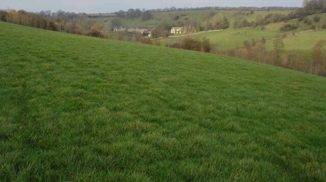 Newington Bagpath Newington Bagpath is no more than a few houses in a valley with the small church above.