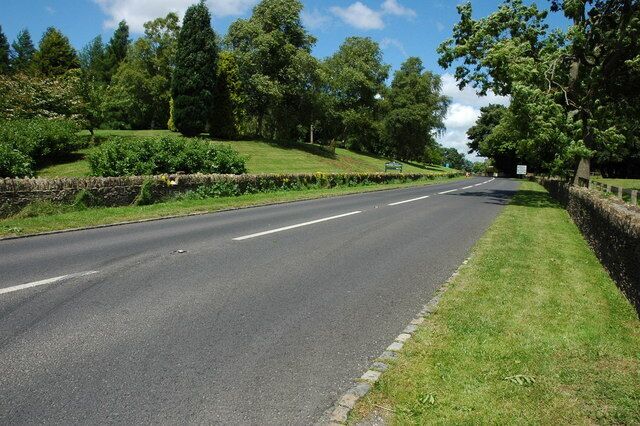 Road past Westonbirt Arboretum The A433 as it passes Westonbirt Arboretum, part of which can be seen on the left beyond the wall.
