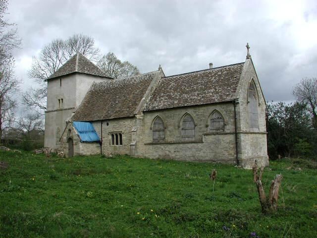 Newington Bagpath (Glos) St Bartholomew's Church. The sad semi-derelict church, sold by the Gloucester diocese and still awaiting conversion by its new owners at the point of submission of this picture, which dates from 2002