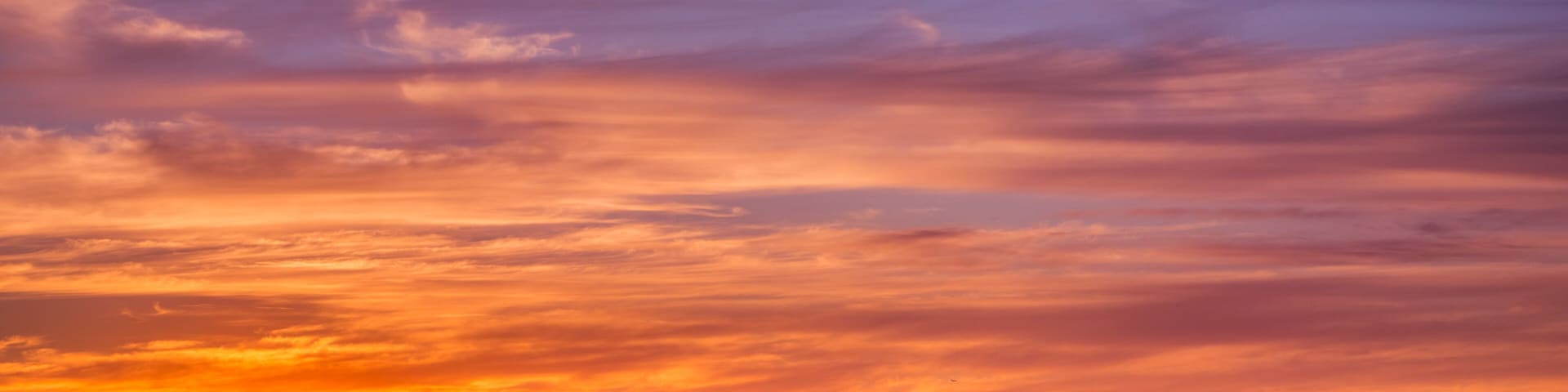 Sunset view of Hayward and Union City from Garin Dry Creek Pioneer Regional Park, east San Francisco bay shoreline and San Mateo bridge in the background, California