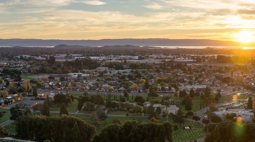 Expansive sunset panorama comprising the cities of east San Francisco bay, Fremont, Hayward and Union City, California