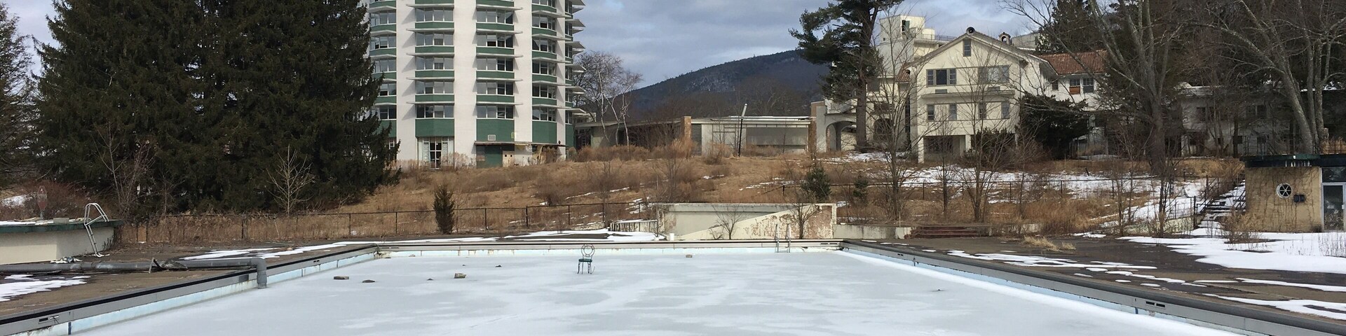 Swimming pool and hotel buildings at an old abandoned resort in the Catskills!!!