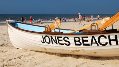 A beach with a rowboat labeled "JONES BEACH" and people walking along the shore.