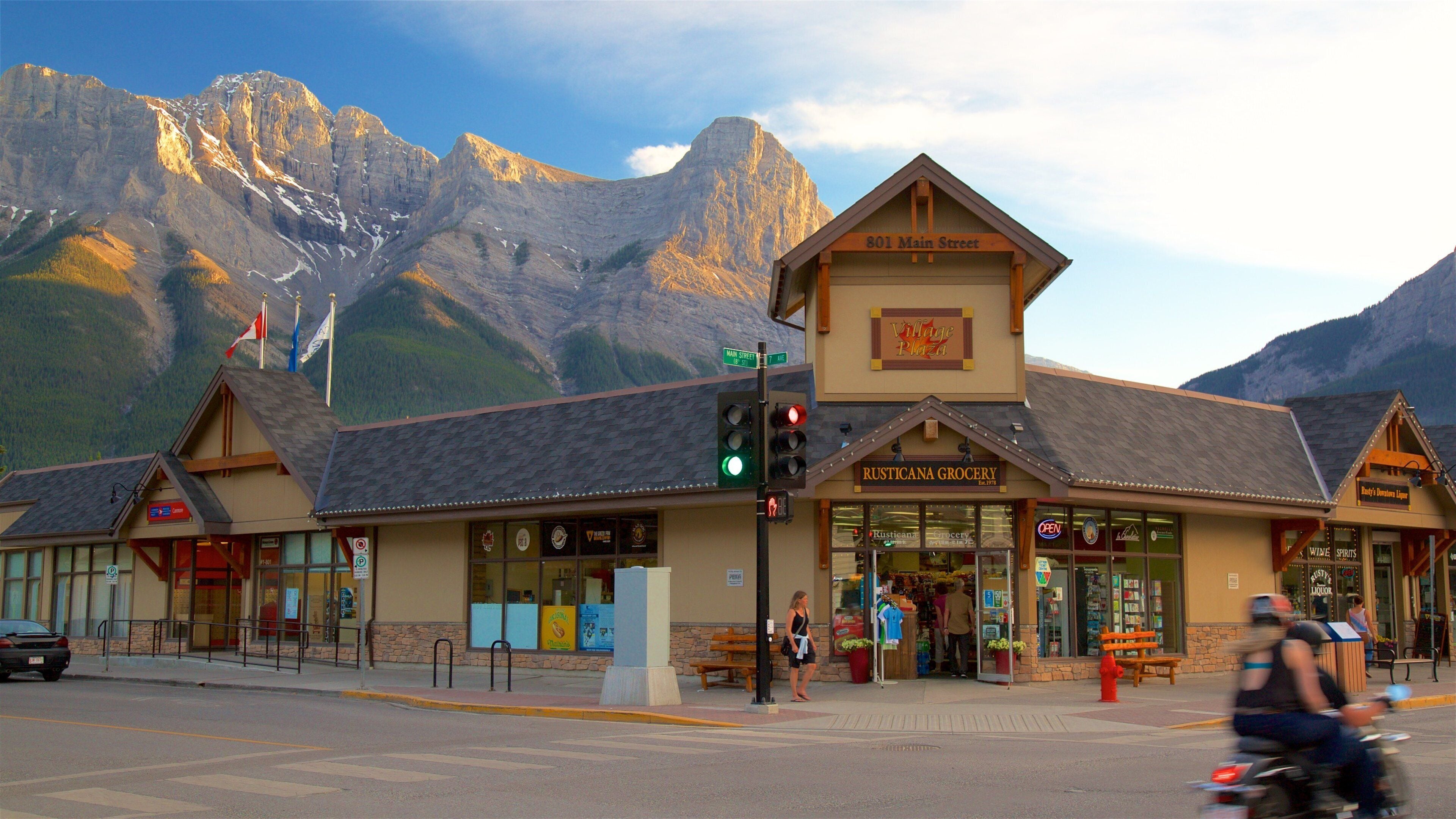 A mountain town with a grocery store and a plaza.