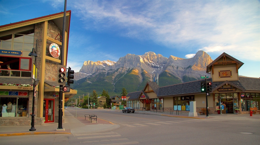 Canmore showing mountains and a small town or village