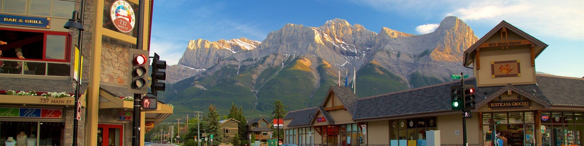 Canmore showing mountains and a small town or village
