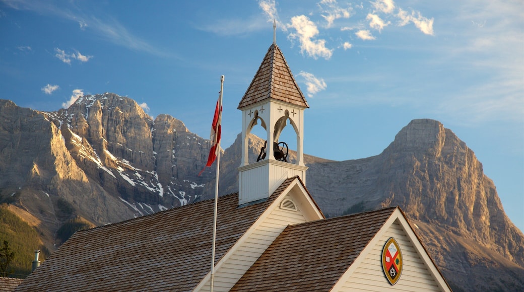 Canmore which includes mountains, a sunset and heritage elements