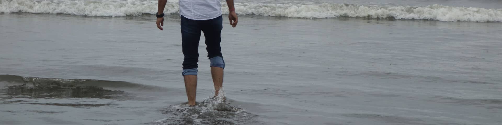 My Husband exploring how cold the water can be on a cloudy beach Day :)
#lifeatexpedia
