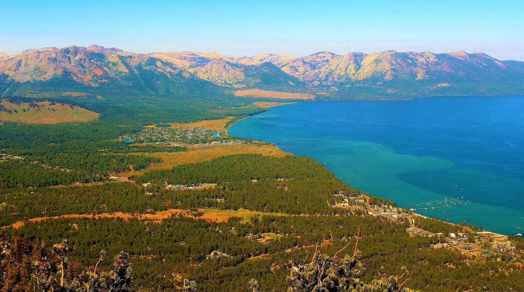 I took this at South Lake Tahoe, California on August 29th. Taken high above the lake, at Heavenly Gondola Vista Point :). This is one of the most iconic views of Lake Tahoe, a lake very popular among Americans. I loved seeing the gorgeous, colorful lake. And the vast landscape surrounding it. The lush, green forest seemed to go on forever. And the mountains were epic! You can even see some snow still atop the mountains. But best of all was the deep, serene lake! I was also at Tahoe for a family wedding. A perfect place for such an occasion!