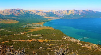 I took this at South Lake Tahoe, California on August 29th. Taken high above the lake, at Heavenly Gondola Vista Point :). This is one of the most iconic views of Lake Tahoe, a lake very popular among Americans. I loved seeing the gorgeous, colorful lake. And the vast landscape surrounding it. The lush, green forest seemed to go on forever. And the mountains were epic! You can even see some snow still atop the mountains. But best of all was the deep, serene lake! I was also at Tahoe for a family wedding. A perfect place for such an occasion!