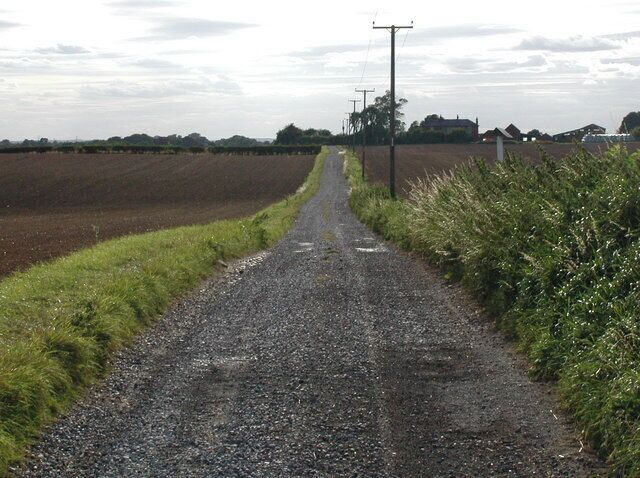 Cony Hill, Rise, East Riding of Yorkshire, England. Looking west-southwest from Cony Hill along the farm track to Wood End Farm, near the southeast corner of Rise Park.