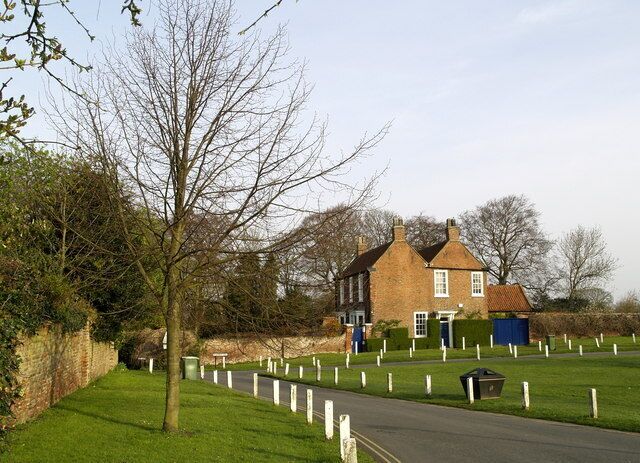 Market Hill, Hedon, East Riding of Yorkshire, England. It's many years since an actual market was held here and is far more of a green, but the name still remains! I've put this photograph in the 'Village Green' section, although Hedon is actually a small town (pop. ~8,000) as it has got an elected Mayor. It is supposed to be the smallest town in Britain.