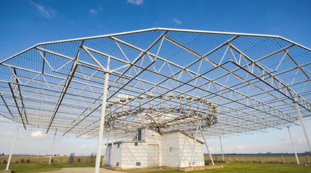 Air navigation beacon, Ottringham, East Riding of Yorkshire, England. This is a NATS (National Air Traffic Services) DVOR (Doppler VHF Omni-directional Range) beacon at the side of Dam Lane. In an otherwise featureless square, it is hard to resist picturing it. Thanks to Rod Allday for the above information, taken from 1489020.