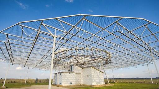 Air navigation beacon, Ottringham, East Riding of Yorkshire, England. This is a NATS (National Air Traffic Services) DVOR (Doppler VHF Omni-directional Range) beacon at the side of Dam Lane. In an otherwise featureless square, it is hard to resist picturing it. Thanks to Rod Allday for the above information, taken from 1489020.