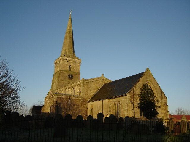 Church, Ottringham, East Riding of Yorkshire, England. Early morning shot of St Wilfred's church. The clock had stopped at 11:30, I know not when.