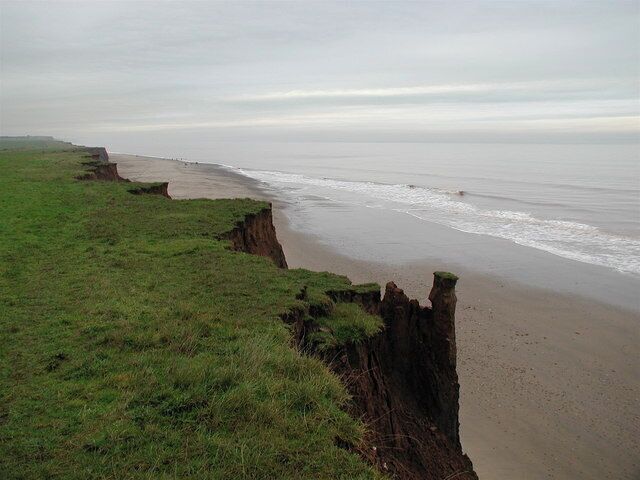 Tunstall Cliffs, Tunstall, East Riding of Yorkshire, England. Just north of the WW2 pillbox by the bridleway between Seaside Lane and Pasture Lane. Although the Ordnance Survey map for this area says 'revised for selected change 2006' much of the cliff edge is a good 50 metres inland from where it's plotted on the map.