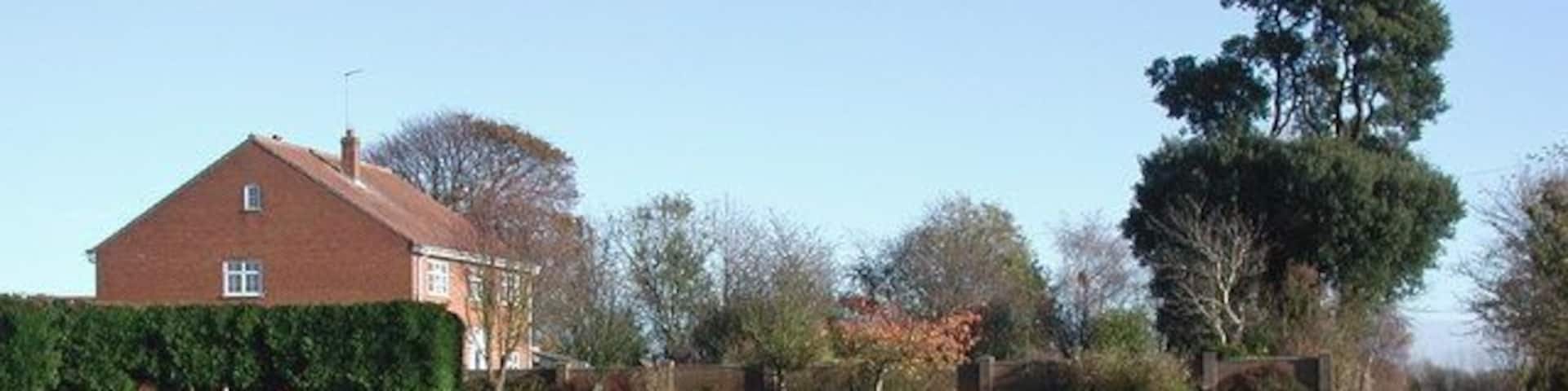 Hatfield Grange, south east of Great Hatfield, East Riding of Yorkshire, England. The modern farmhouse at Hatfield Grange, looking east along the bridleway between Withernwick Road and Hatfield Wood. Formerly part of the Bethell family estate, the 252 acre farm east of Great Hatfield village was sold to John R. Rawson in 1942.