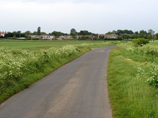 On the minor road south of Keyingham, East Riding of Yorkshire, England. Looking NNE from MR: TA24652472 towards Keyingham (pronounced Kay-ing-ham - many people call it Kee-ing-ham though!)
