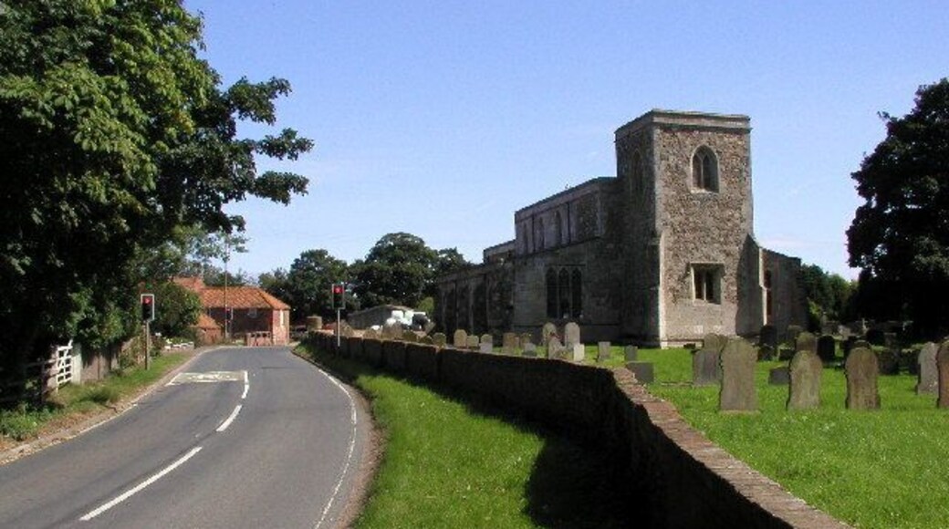 St Mary's, Welwick Village Church, East Riding of Yorkshire. The road here does a sharp 'S' bend around the church and traffic is governed by traffic lights. Picture taken at MR: TA34082114 looking eastwards.