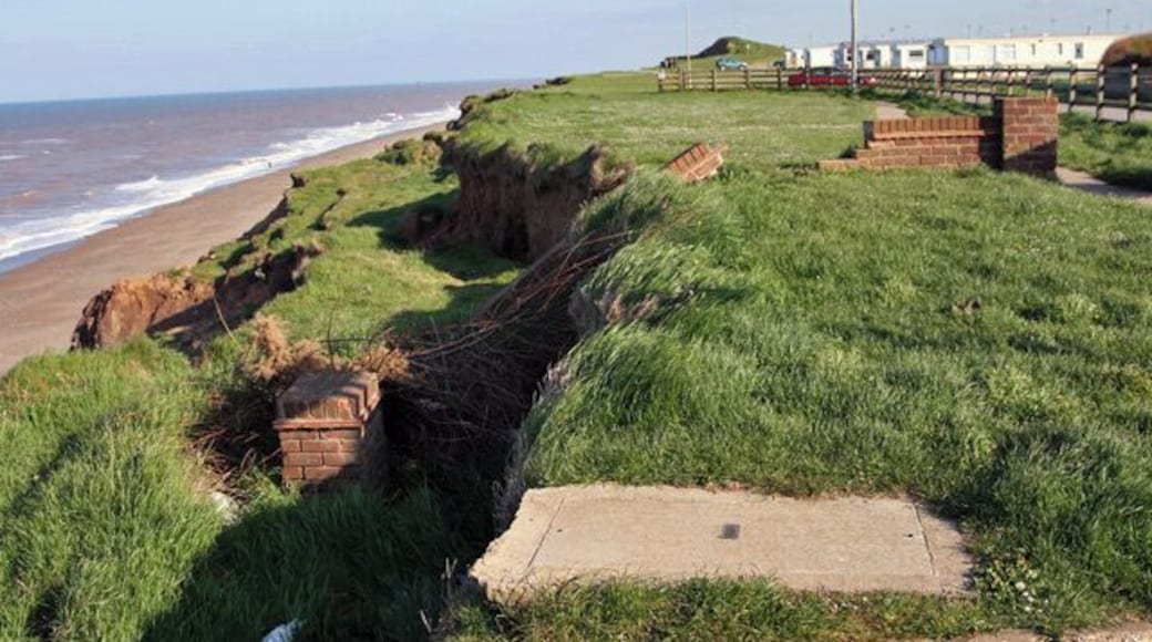 Cliff erosion at Mount Pleasant, Aldbrough, East Riding of Yorkshire, England. Looking south at the end of the lane (Seaside Road) from Aldbrough to the sea, the recent and progressive erosion of the clay cliffs continues. Just one or two of the caravans are visible on the photograph.