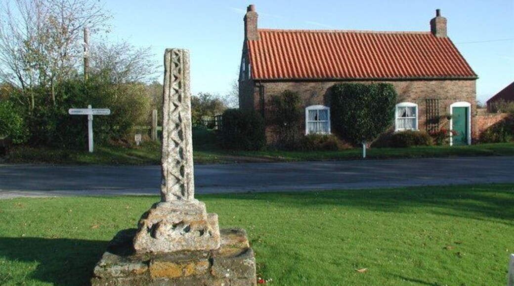 Great Hatfield Cross, Great Hatfield, East Riding of Yorkshire, England. The carved shaft and base of a medieval cross at the junction of Main Street and Cross Street, Great Hatfield.