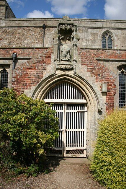 St.Mary's church porch Much rebuilt in brick in the 17th century, the porch was originally two storeys with an upper chamber accessible from inside the church. The canopied niche above the door has a mutilated statue of the Virgin Mary and infant Christ