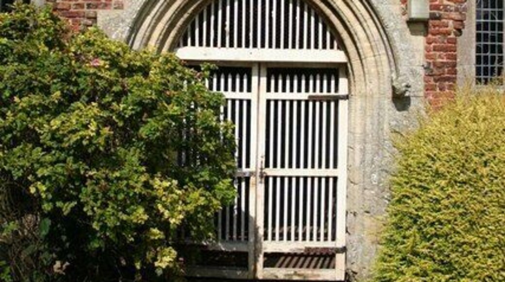 St.Mary's church porch Much rebuilt in brick in the 17th century, the porch was originally two storeys with an upper chamber accessible from inside the church. The canopied niche above the door has a mutilated statue of the Virgin Mary and infant Christ