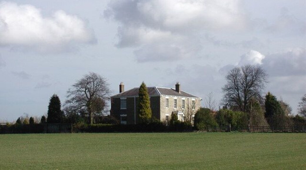 Langthorpe Hall, New Ellerby, East Riding of Yorkshire, England. There was a manor at Langthorpe from 1066, possibly until the mid 19th century when Langthorpe Hall was used as a farm. The house was rebuilt in grey brick in about 1830, with the addition of a Tuscan portico in 1990-91.