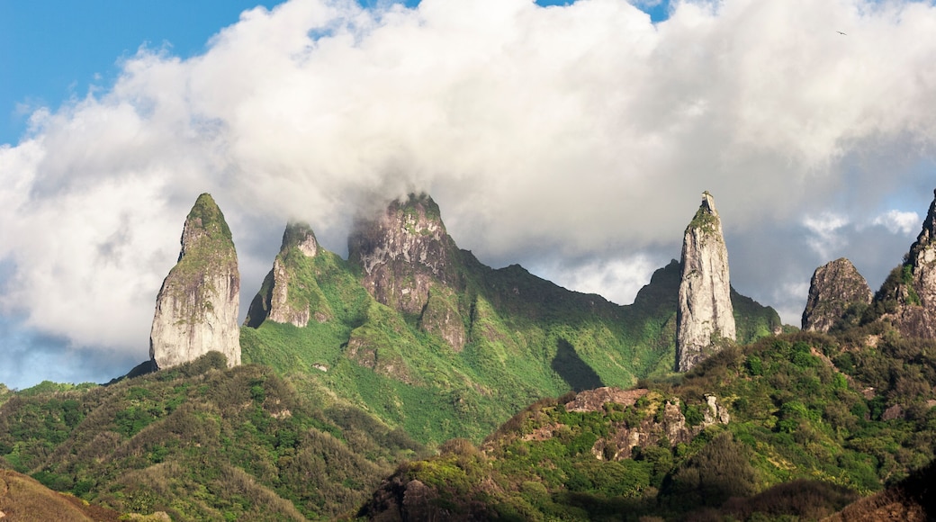 approaching Ua Pou Island from sea, Marquesas Archipelago, French Polynesia, spectacular landscape with extremely steep mountains