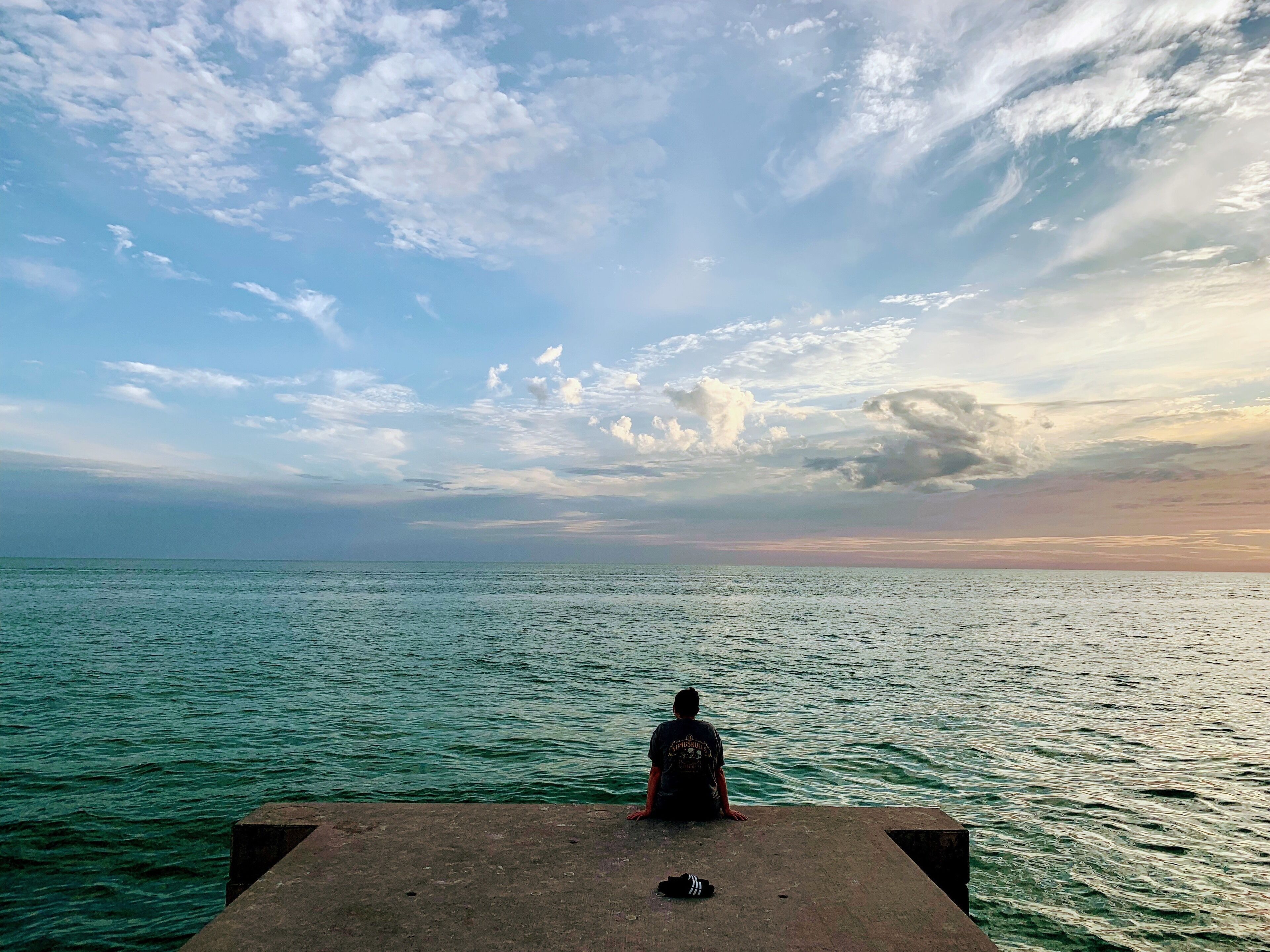 My daughter sitting on the edge of the world