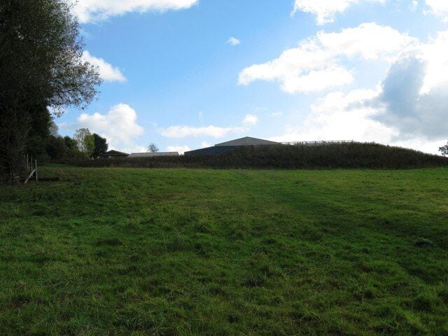 Uphill view of barn roofs at Chelwood Farm