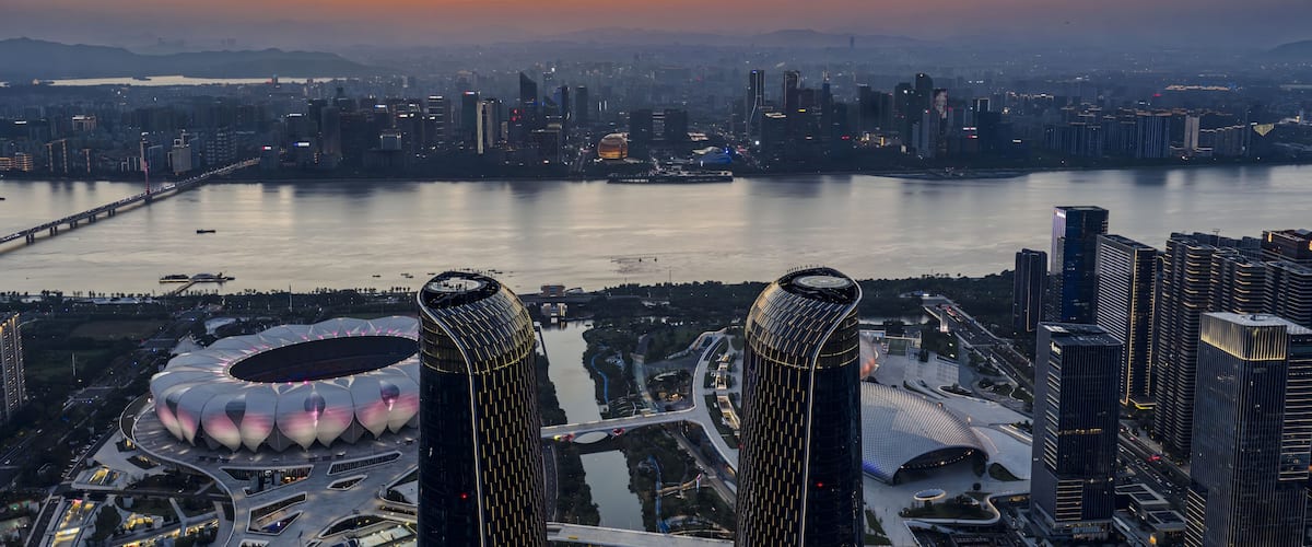 Sunset Over Qiantang River, Hangzhou - Modern Cityscape Panorama with Golden Light
