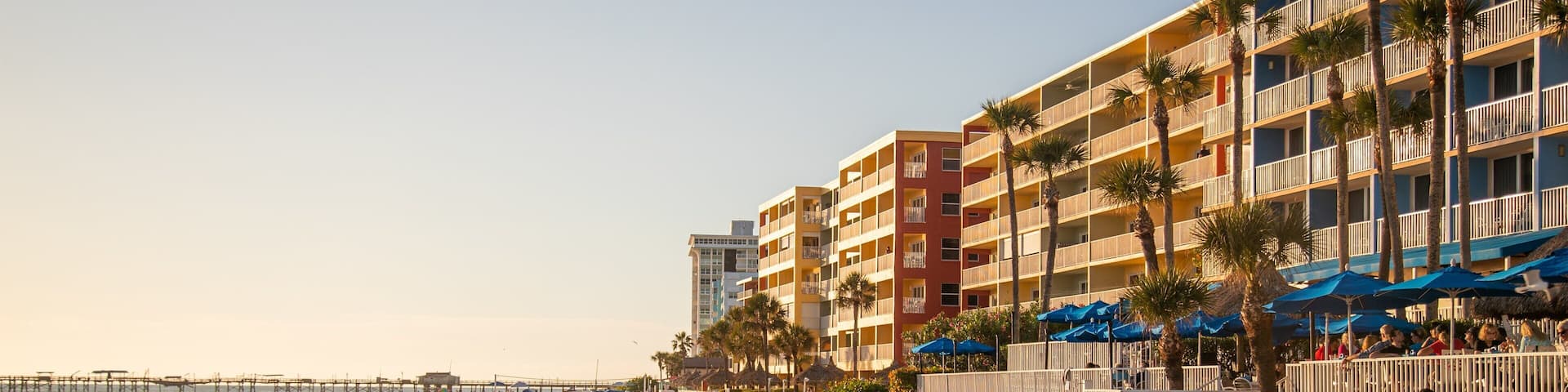 Redington Beach which includes a sunset, a beach and general coastal views
