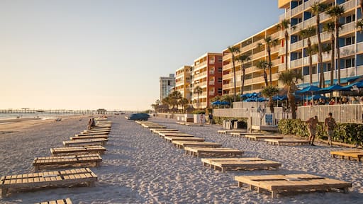 Redington Beach which includes a sunset, a beach and general coastal views