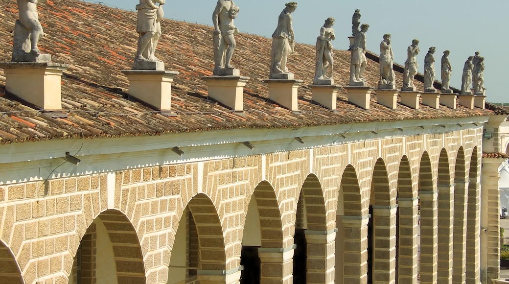 Rows of classic style statues above Villa Manin porch, Udine, Italy