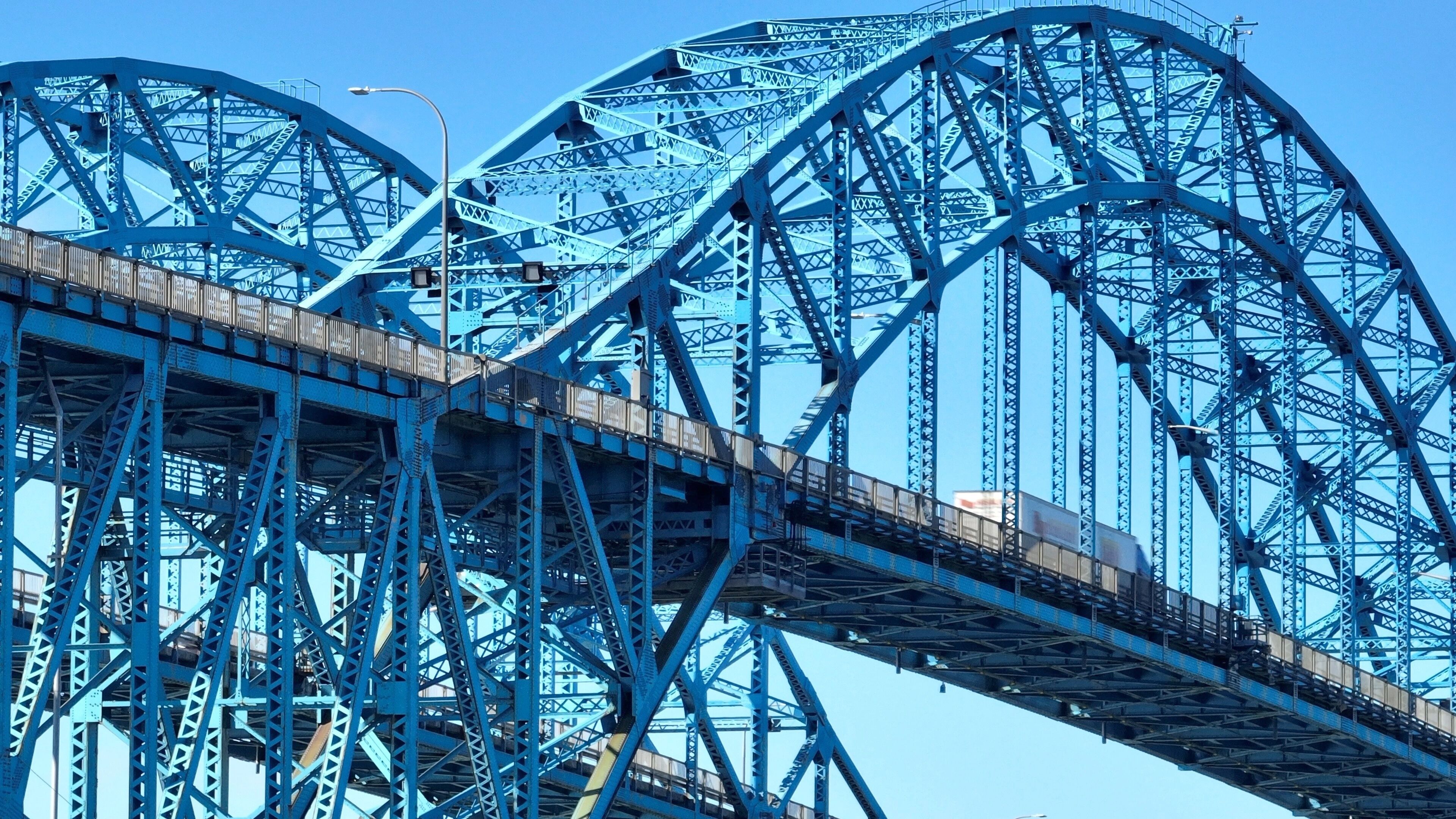 Transportation and travel across South Grand Island Bridge over Niagara River near Buffalo, New York beautiful architecture and engineering with blue sky