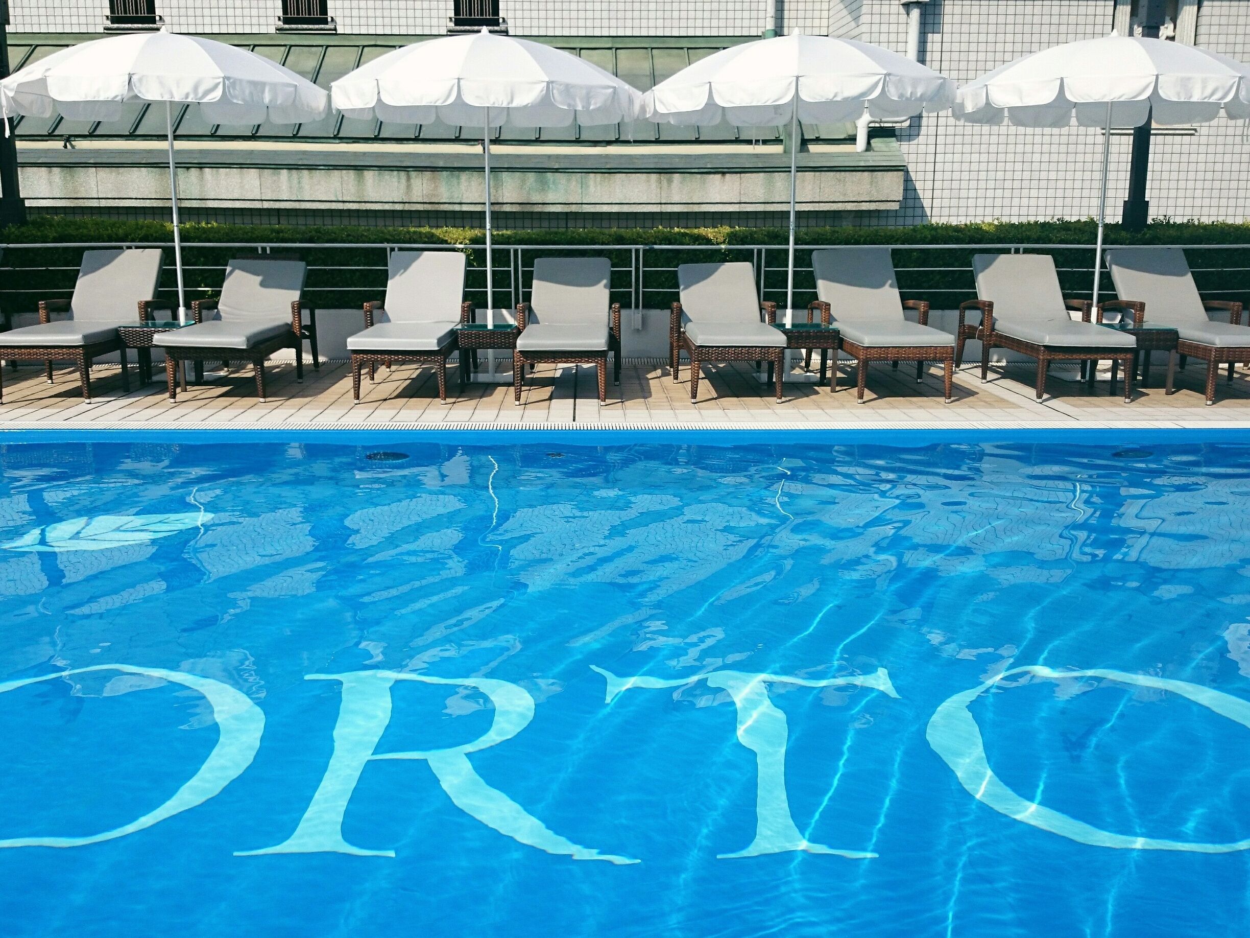 A little distance from downtown Kobe, this hotel has a small rooftop pool for you to enjoy. The lounge chairs are quickly full but it's the perfect spot to read a book or snooze under the sun.

As the hotel is quick close to Kobe Airport, I recommend it for people who are heading that way or for anyone who doesn't mind using the monorail transportation to get to downtown Kobe.