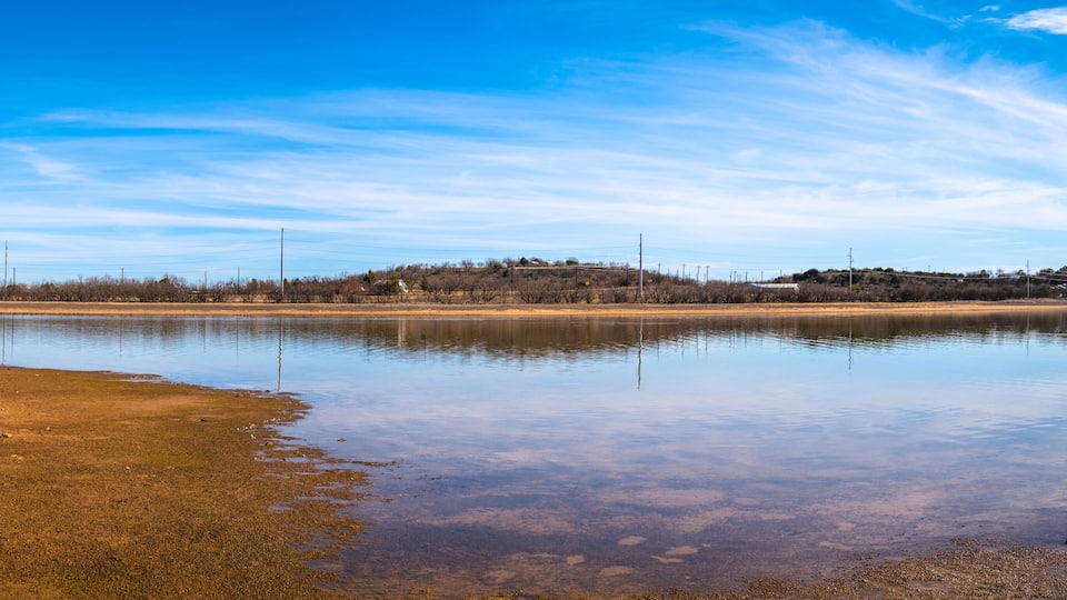 Tranquil sunny landscape of curving cove at Lake Fort Phantom Hill in Abilene, Taylor and Jones Counties, Texas, USA