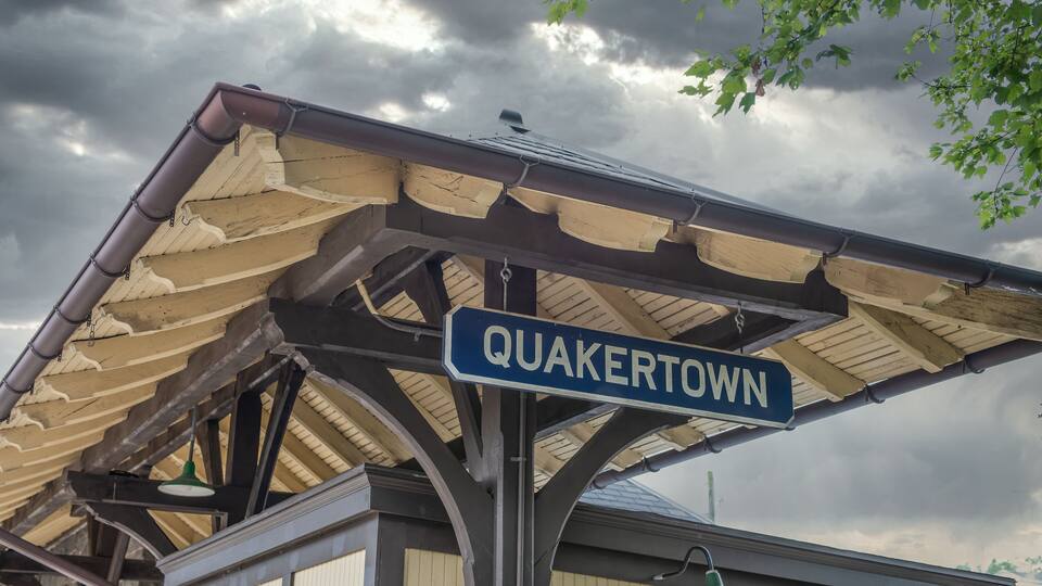 A weathered roof with a 'QUAKERTOWN' sign.